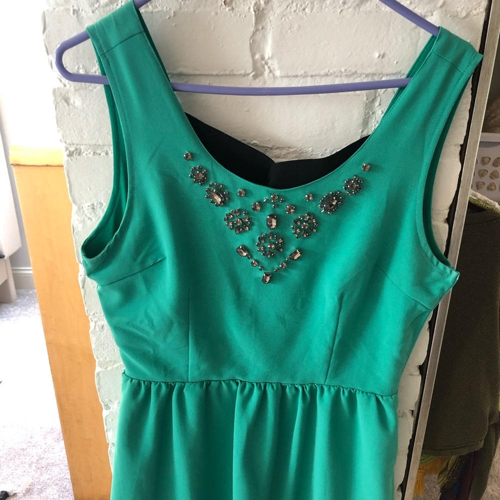 Emerald green embellished dress